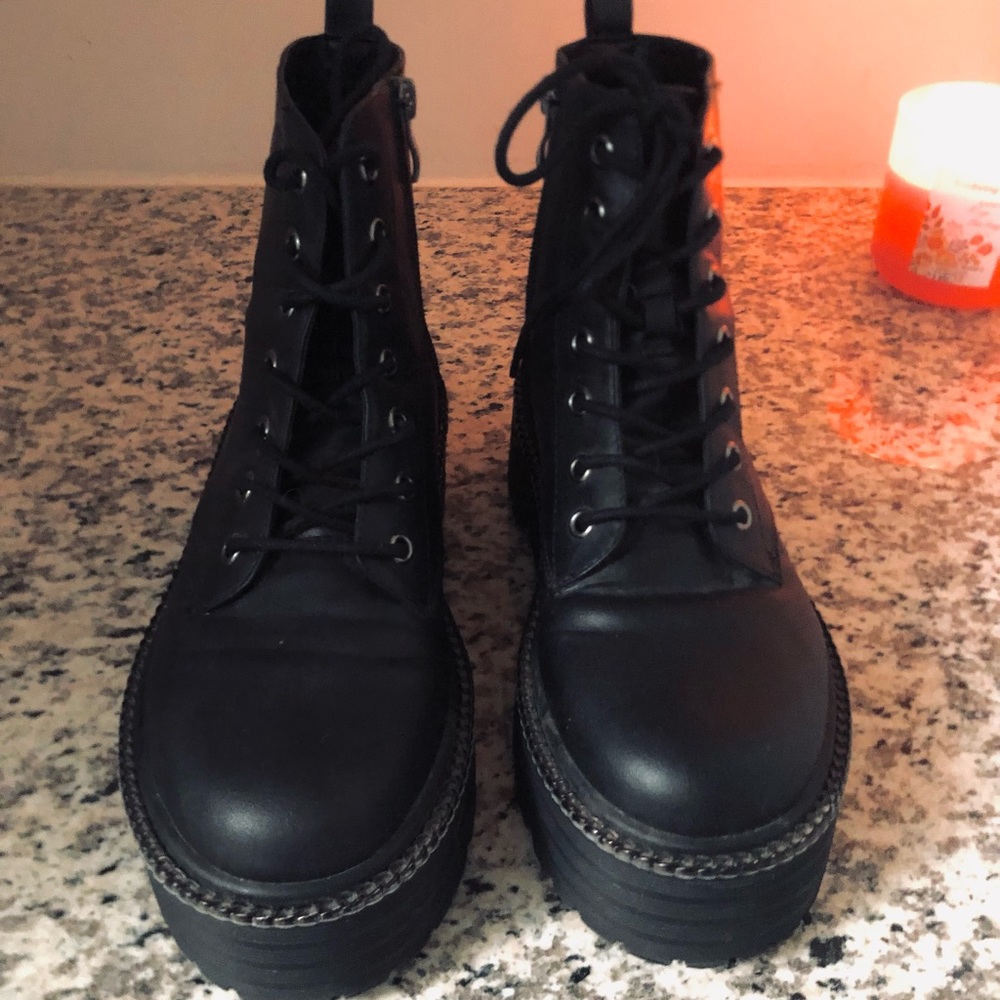 Lace up boots.